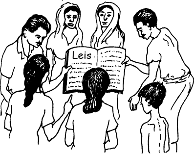A group of people circle around a book of laws.