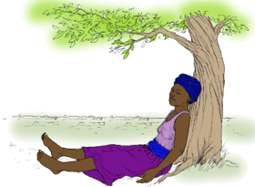 Person relaxing under a tree.