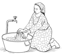 a woman washing laundry